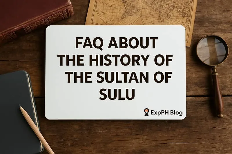FAQ card about the history of the Sultan of Sulu on a wooden desk with books, map, magnifying glass, and ExpPH Blog logo