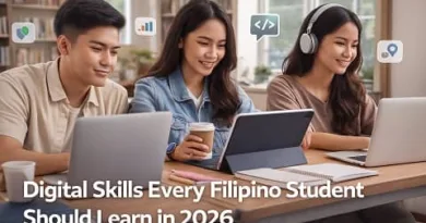 A group of Filipino students using laptops and tablets in a modern classroom, symbolizing essential digital skills needed for 2026, with the ExpPH Blog logo displayed.