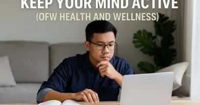 A Filipino man studying at home while using a laptop and an open book, symbolizing the importance of keeping the mind active for OFW health and wellness, with the ExpPH Blog logo in the image.