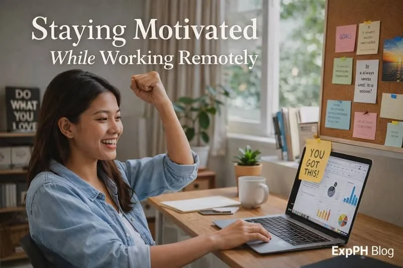 Filipino remote worker smiling at her laptop while staying motivated and productive in a home office setup