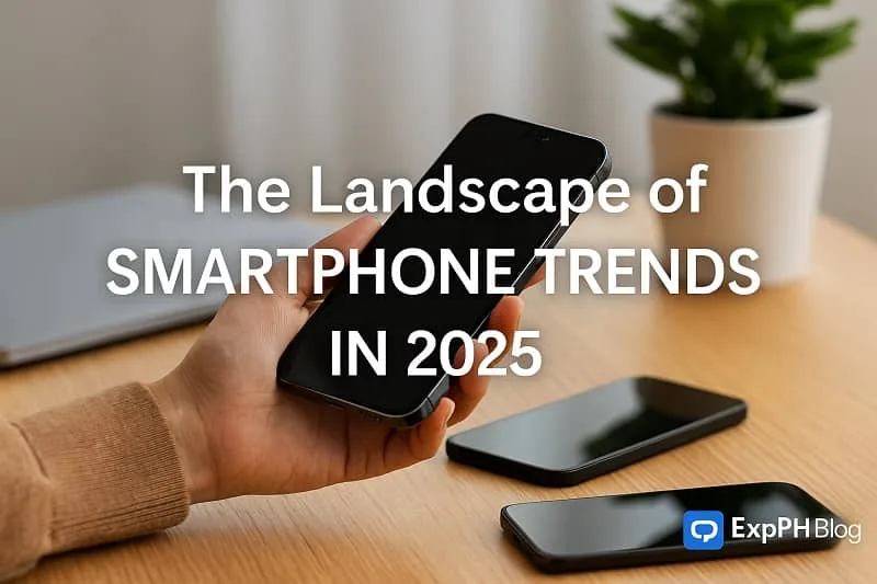 A realistic scene of a person holding a smartphone on a wooden table with other phones, a laptop, and the ExpPH Blog logo, featuring the text The Landscape of Smartphone Trends in 2025.