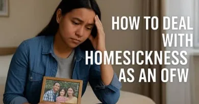 A realistic image of an OFW woman sitting on her bed while holding a family photo, looking emotional as she deals with homesickness, with the ExpPH Blog logo on the lower right.