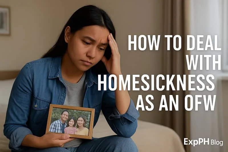 A realistic image of an OFW woman sitting on her bed while holding a family photo, looking emotional as she deals with homesickness, with the ExpPH Blog logo on the lower right.
