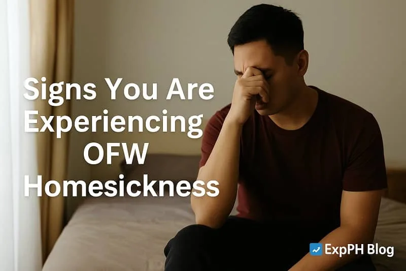 A realistic image of a Filipino man sitting on his bed looking stressed and emotional, holding his forehead as he experiences signs of OFW homesickness, with the ExpPH Blog logo in the corner.