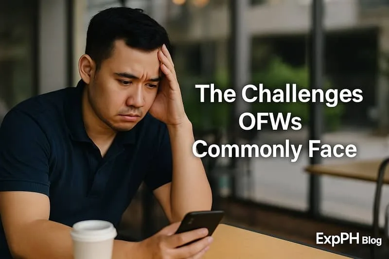 A realistic photo of a worried Filipino man sitting alone in a public place, looking stressed while holding his phone. The background shows a blurred outdoor setting, and the text “The Challenges OFWs Commonly Face” appears beside him, along with the smaller ExpPH Blog logo.