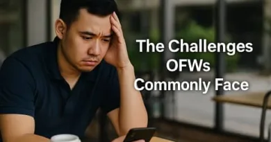 A realistic photo of a worried Filipino man sitting alone in a public place, looking stressed while holding his phone. The background shows a blurred outdoor setting, and the text “The Challenges OFWs Commonly Face” appears beside him, along with the smaller ExpPH Blog logo.