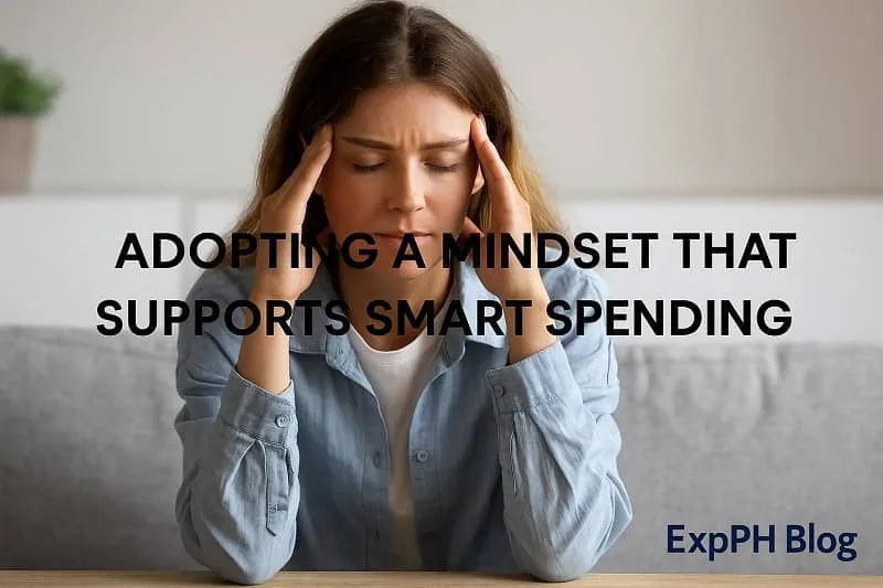 Woman thinking deeply with hands on temples, representing a mindset shift for Smart Spending habits.