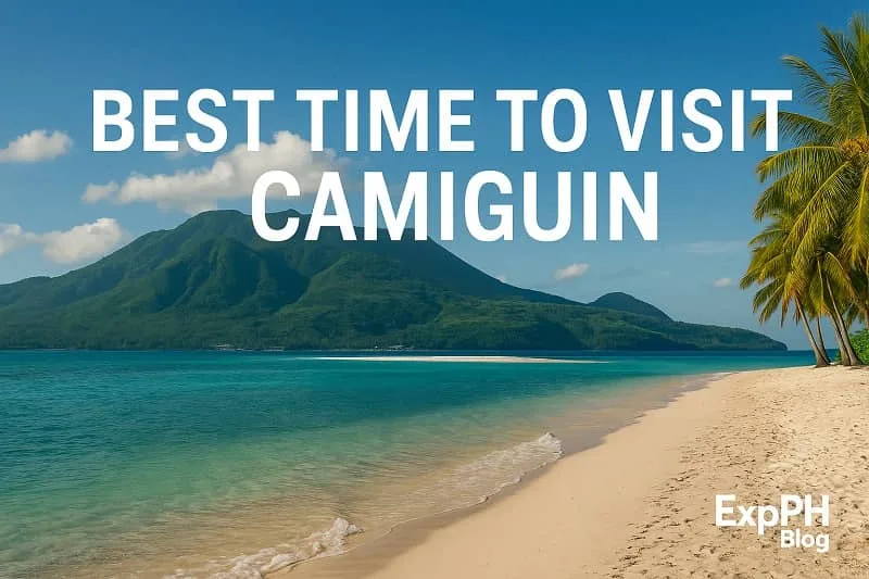 A realistic beach scene in Camiguin showing clear turquoise water, palm trees, Mount Hibok Hibok, bright skies, and the ExpPH Blog logo.