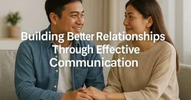 Filipino couple communicating warmly at home while holding hands, representing building better relationships through effective communication.