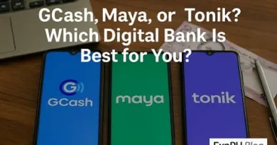 Three smartphones showing GCash, Maya, and Tonik apps on a desk, comparing digital banks in the Philippines with ExpPH Blog logo visible.