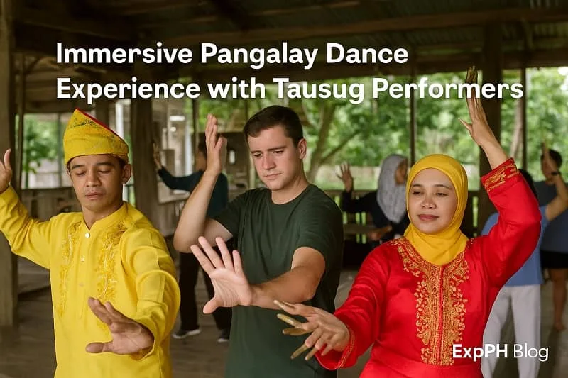 Tausug performers teaching the Pangalay Dance to visitors in a traditional cultural setting.