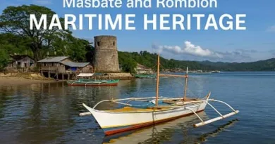 A realistic coastal view of Masbate and Romblon showing traditional boats, a historic watchtower, and calm blue waters with the ExpPH Blog logo.