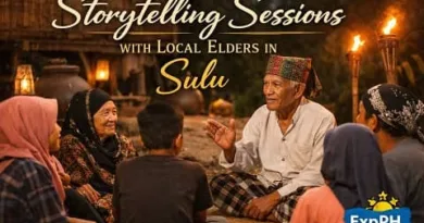 Storytelling Sessions with Sulu Elders sharing cultural stories with youth in a traditional Sulu community setting during an evening gathering