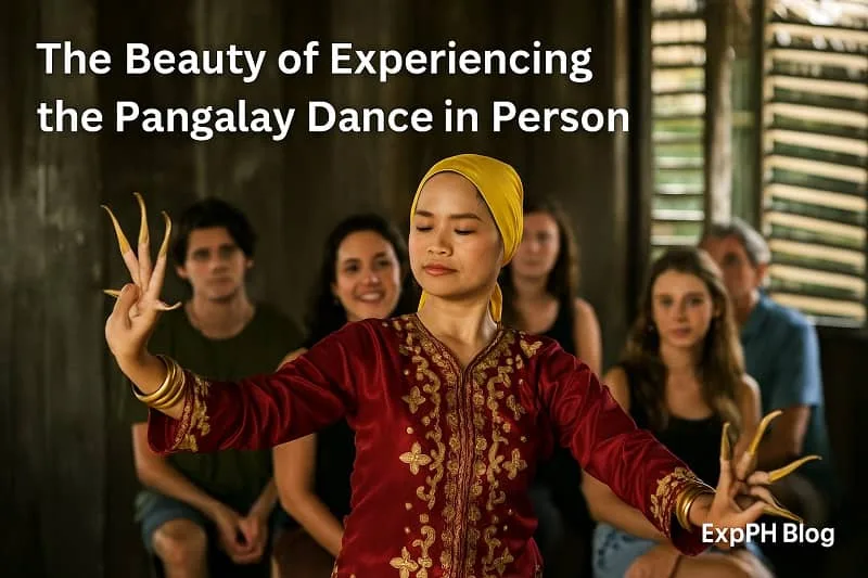 A Tausug dancer performing the Pangalay Dance gracefully in front of an appreciative audience.