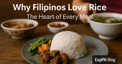 A traditional Filipino meal with steamed white rice at the center, surrounded by classic viands, showing rice as the heart of everyday Filipino dining.