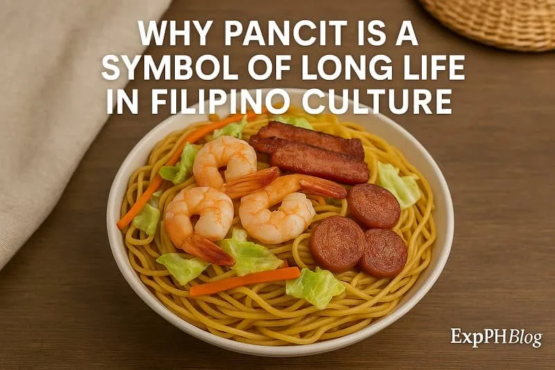 A realistic bowl of pancit with shrimp, vegetables, and meat, representing Filipino culture and the symbolism of long life, with the ExpPH Blog logo.