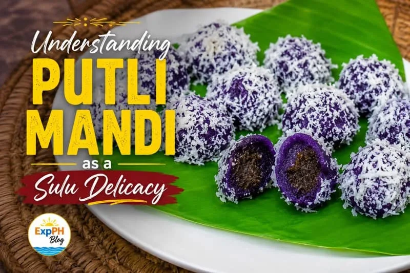 Traditional Sulu Putli Mandi delicacy made of purple sweet rice balls coated with grated coconut and filled with sweet coconut filling, displayed on a banana leaf with ExpPH Blog branding.