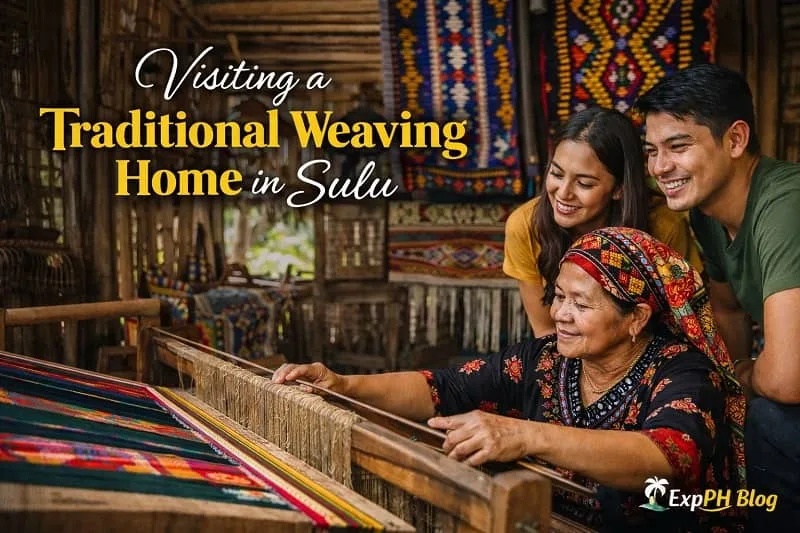 Filipino weaver demonstrating traditional weaving inside a Sulu home while visitors observe the handloom process