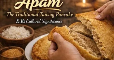 Traditional Tausug Apam pancake being split open, showing soft texture, served with coconut and sugar, representing Tausug food culture in the Philippines.
