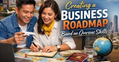 Filipino couple planning an OFW business roadmap at home using overseas experience, laptop, passport, and financial documents with ExpPH Blog logo