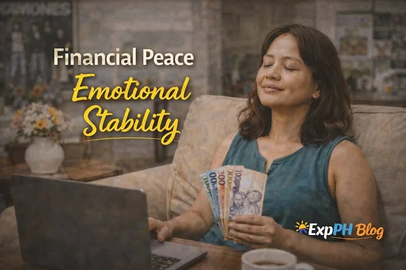 Filipina woman holding Philippine peso bills while sitting calmly at home with a laptop, symbolizing financial peace and emotional stability