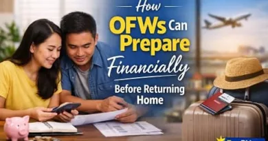 Filipino OFW couple reviewing finances at home while planning their return to the Philippines with travel bags and documents visible