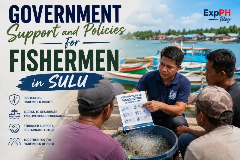 Government officer discussing fisheries support programs with local fishermen beside colorful fishing boats in Sulu, Philippines.